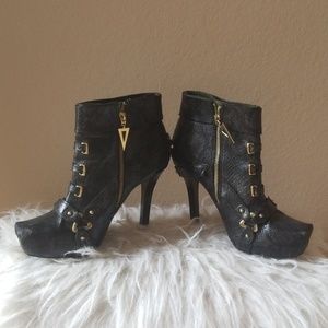 Christian Siriano zip up ankle boots